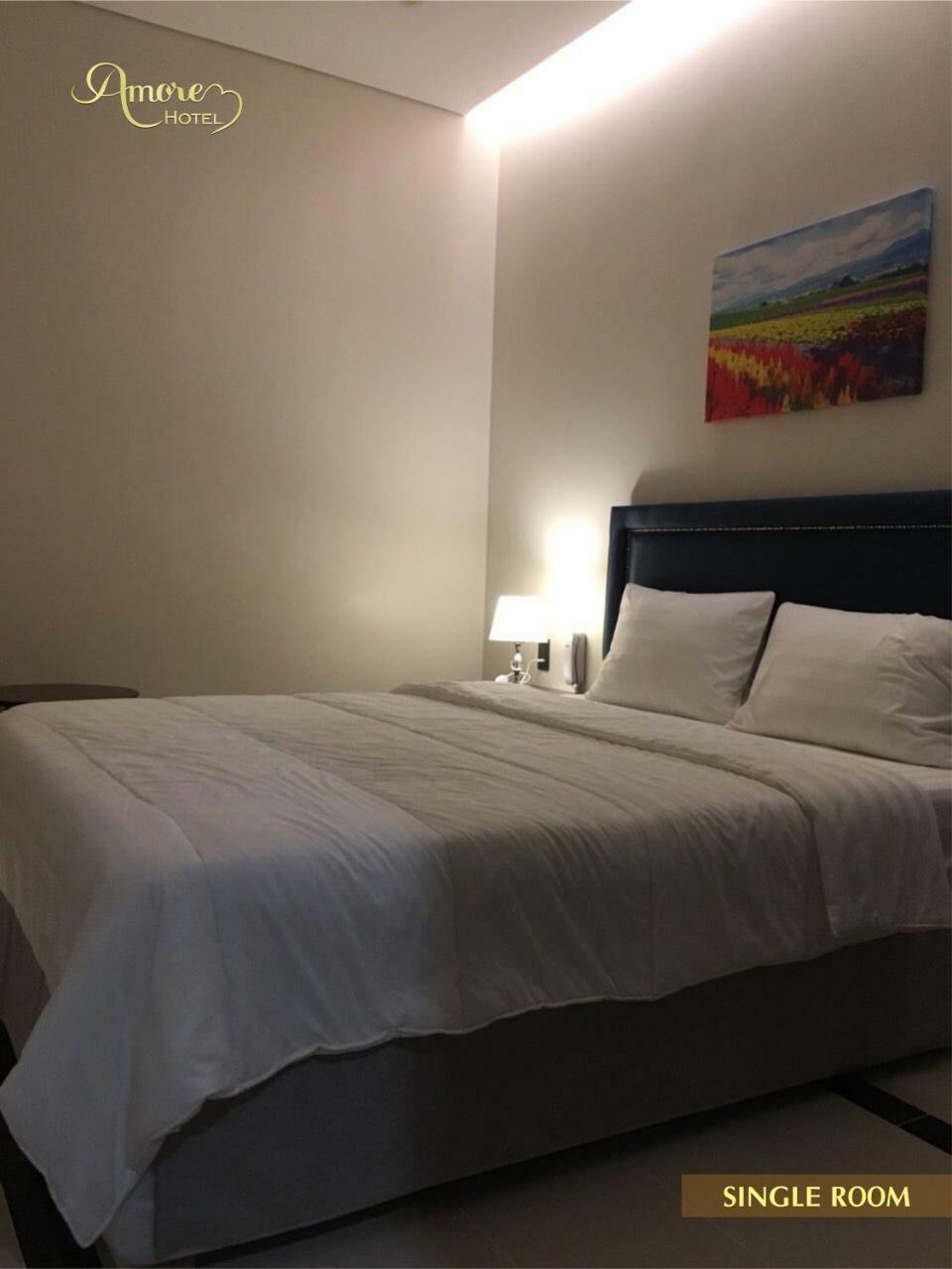 Amore Hotel Кан То Екстериор снимка