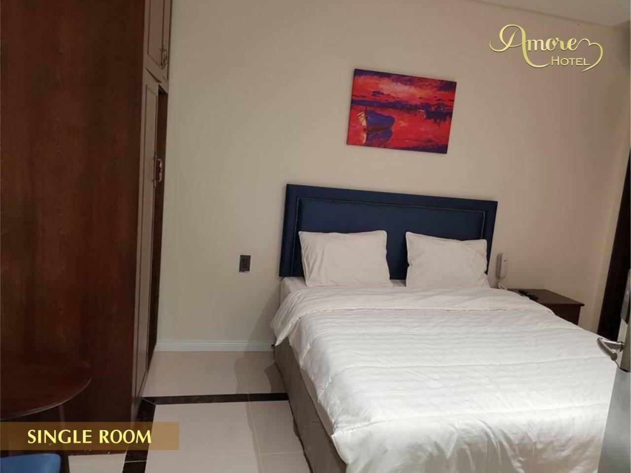 Amore Hotel Кан То Екстериор снимка