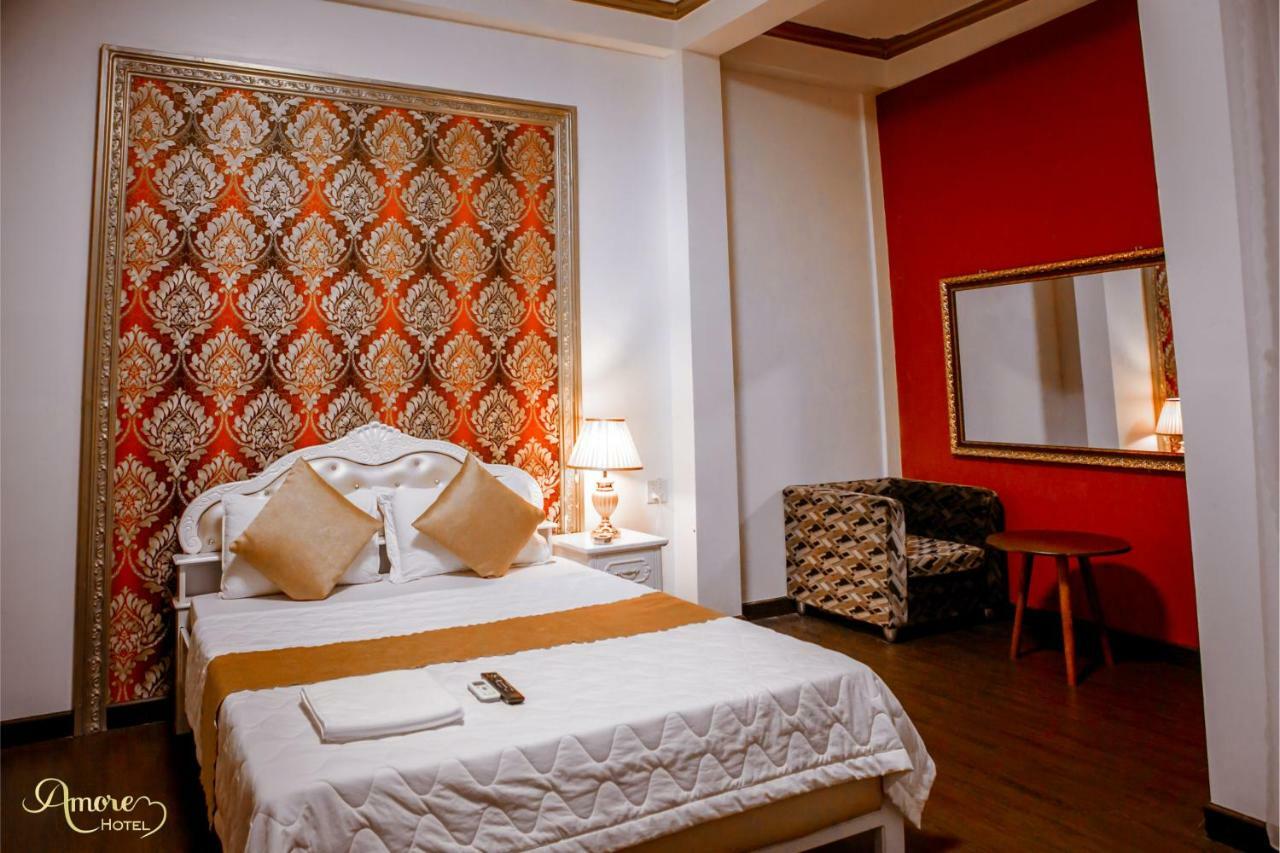 Amore Hotel Кан То Екстериор снимка