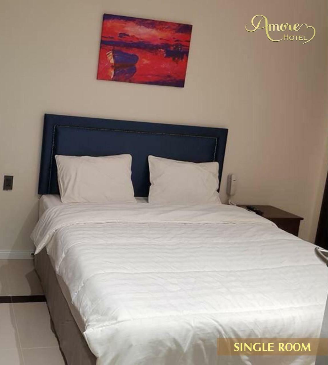 Amore Hotel Кан То Екстериор снимка