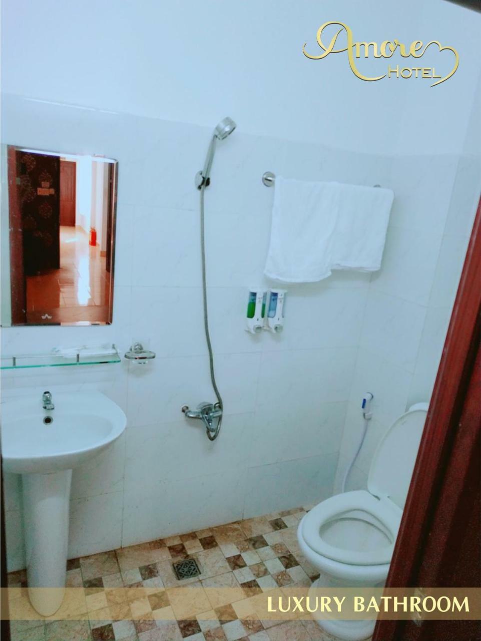 Amore Hotel Кан То Екстериор снимка